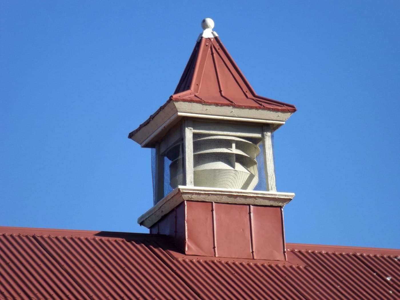 A rooftop ventilator unit installed on a building